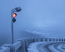 Optimization of Winter Maintenance Stations for Safe and Efficient Freight Transportation